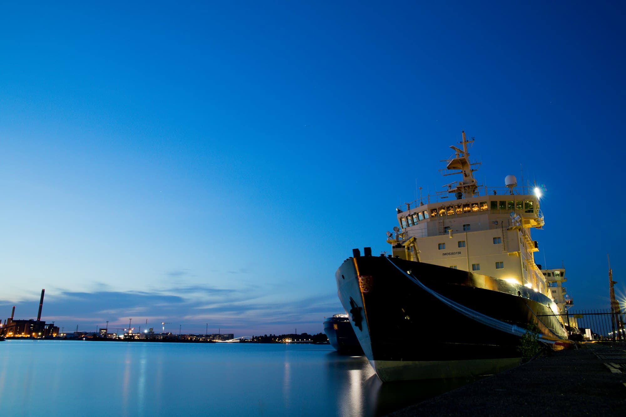 A ship alongside at dusk