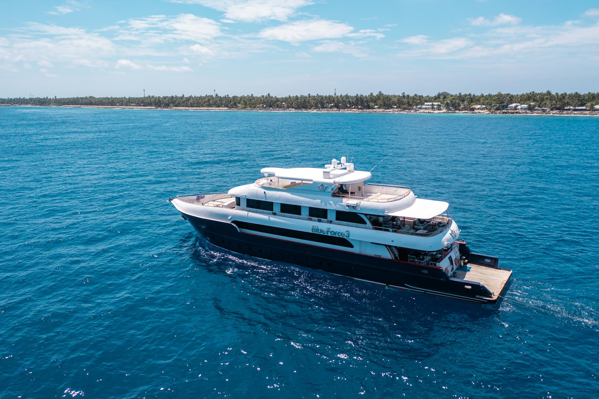 A motor yacht under way on open water